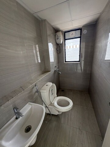 Bathroom in 3 BHK Apartment at Runwal Gardens Phase I, Dombivli East – for Rent