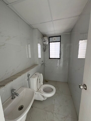 Bathroom in 3 BHK Apartment at Runwal Gardens Phase I, Dombivli East – for Rent