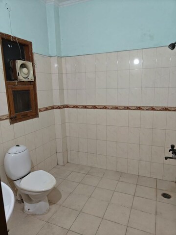 Bathroom in 3 BHK Apartment at Antriksh Golf View, Sector 78 – for Rent