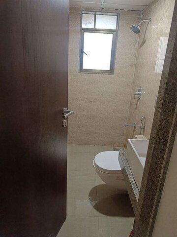 Bathroom in 1 BHK Apartment at Sunteck West World, Tivri – for Rent