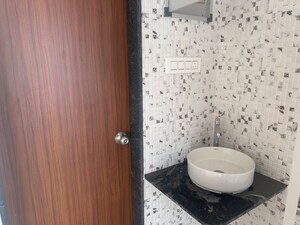 Bathroom in 3 BHK Apartment at Vrunda Shlok, Moshi – for Rent