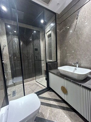 Bathroom in 4 BHK Builder Floor at Gulmohar Park – for Sale