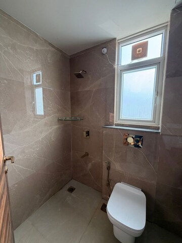 Bathroom in 3 BHK Apartment at Smart World Orchard, Sector 61 – for Rent