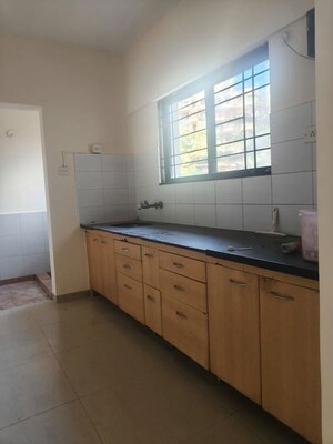 Kitchen in 2 BHK Apartment at Prakriti Society, Baner – for Rent