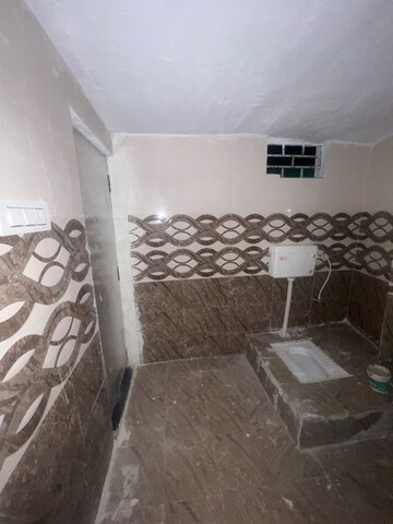 Bathroom in 2 BHK Apartment at Milan Tower, Adil Nagar – for Rent