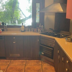 Kitchen in 4 BHK Builder Floor at Sarvodaya Enclave – for Sale