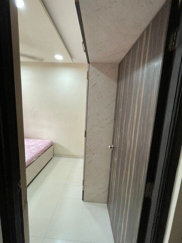 Bedroom in 2 BHK Apartment at Chandiwala Pearl Harmony, Andheri West – for Rent