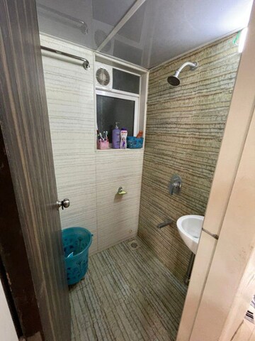 Bathroom in 2 BHK Apartment at Chandiwala Pearl Harmony, Andheri West – for Rent