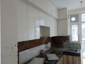 Kitchen in 2 BHK Apartment at Amrapali Heartbeat City, Sector 107 – for Rent