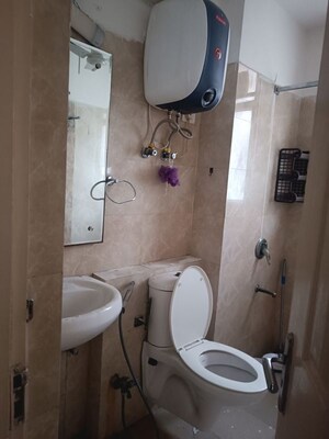 Bathroom in 3 BHK Apartment at Amrapali Heartbeat City, Sector 107 – for Sale