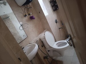 Bathroom in 3 BHK Apartment at Amrapali Heartbeat City, Sector 107 – for Sale