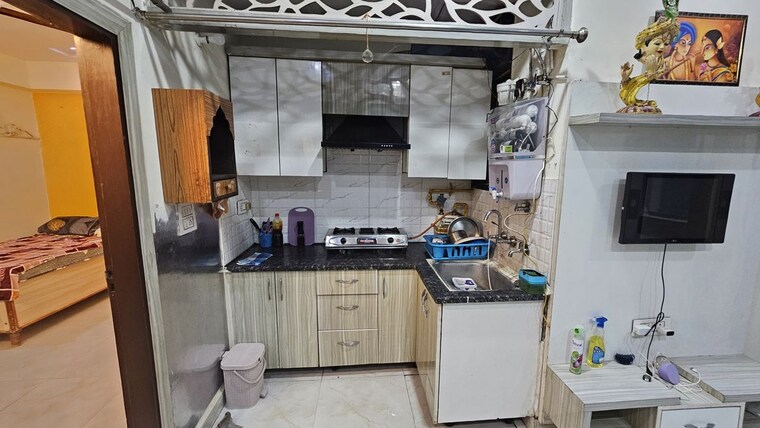 Kitchen, rwa-apartments-sector-50 2 Bedroom 1050 Sq.Ft. Builder Floor In Sector 50 Noida 9801016