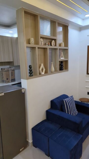 Living Room in 2 BHK Apartment at Antriksh Golf View, Sector 78 – for Rent