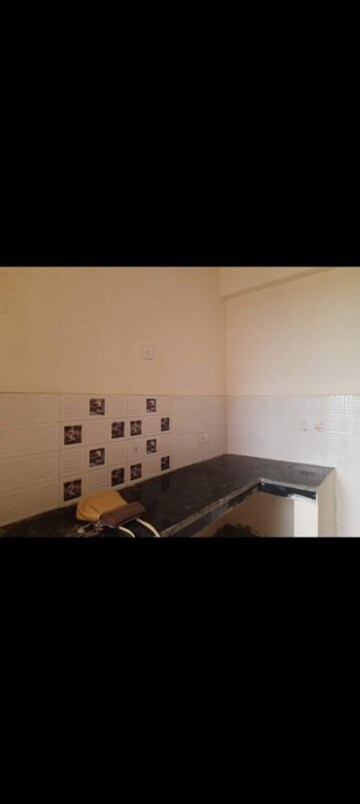 Kitchen in 1 BHK Apartment at Eureka Diya Green City, Raj Nagar Extension – for Sale