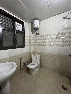 Bathroom in 3 BHK Builder Floor at Ansal Sushant Apartments, Sushant Lok I – for Rent