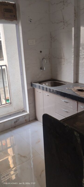 Kitchen in 2 BHK Apartment at Smith Towers, Nalasopara West – for Sale