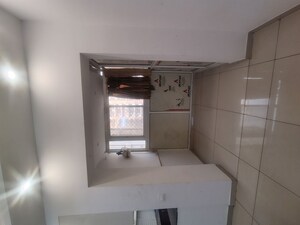 Kitchen in 2 BHK Apartment at Gulshan Bellina, Sector 16 Greater Noida – for Rent