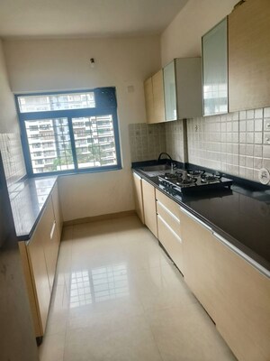 Kitchen in 2 BHK Apartment at Adi Skyline Apartments, Wakad – for Sale