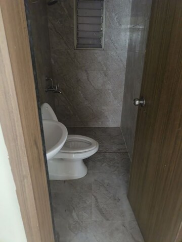 Bathroom in 2 BHK Apartment at Adi Skyline Apartments, Wakad – for Sale