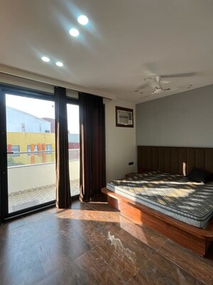 Bedroom in 3 BHK Builder Floor at Ansal Sushant Apartments, Sushant Lok I – for Rent