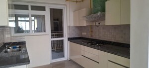 Kitchen in 3 BHK Apartment at Smart World Orchard, Sector 61 – for Rent