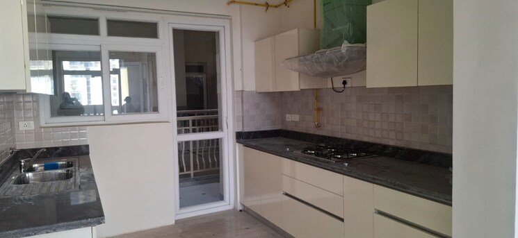 Kitchen, smart-world-orchard 3 Bedroom 1680 Sq.Ft. Apartment In Sector 61 Gurgaon 9801468