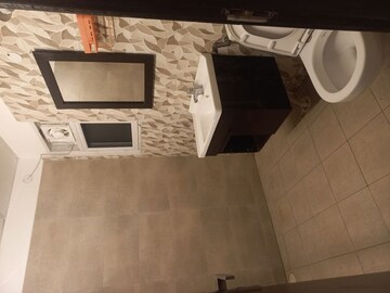 Bathroom in 3 BHK Apartment at Elite Golf Green, Sector 79 – for Sale