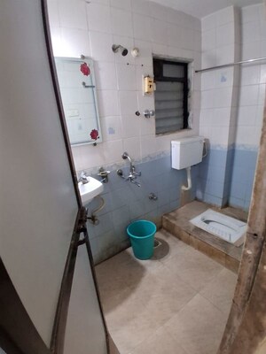 Bathroom in 1 BHK Apartment at Dharti CHS Tilak Nagar, Tilak Nagar – for Rent