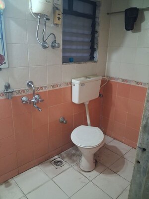 Bathroom in 1 BHK Apartment at Dharti CHS Tilak Nagar, Tilak Nagar – for Rent