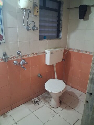Bathroom in 1 BHK Apartment at Dharti CHS Tilak Nagar, Tilak Nagar – for Rent