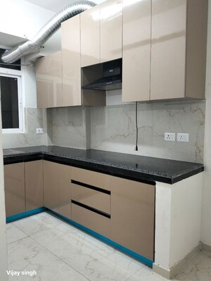 Kitchen in 2.5 BHK Apartment at Smart World Gems, Sector 89 – for Rent