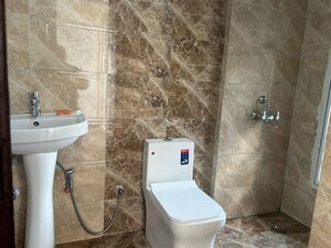 Bathroom in 2 BHK Apartment at Prateek Grand City, Siddharth Vihar – for Rent