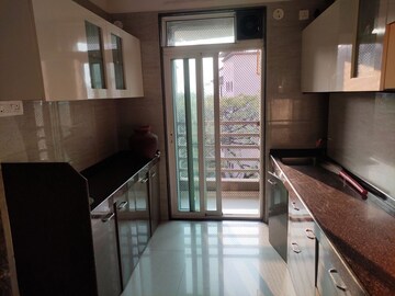 Kitchen in 2 BHK Apartment at Paradigm Ananda Residency, Borivali West – for Sale