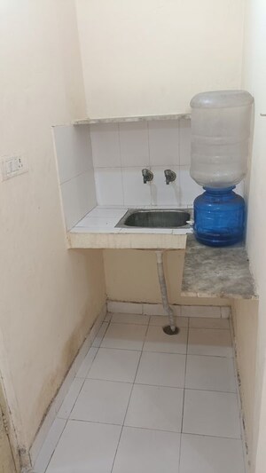 Kitchen in 1 RK Apartment at Arun Vihar Sector 37, Sector 37 – for Rent