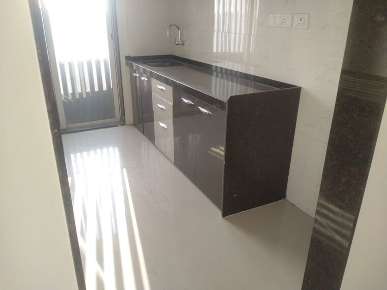 Kitchen, the-shreeji-atlantis 3 Bedroom 1000 Sq.Ft. Apartment In Malad West Mumbai 9801649