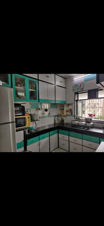 Kitchen in 3 BHK Apartment at Oberoi Sky City, Borivali East – for Sale