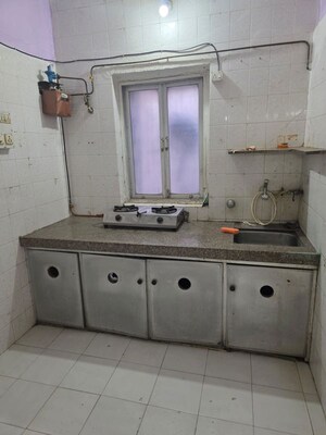 Kitchen in 2 BHK Apartment at Eff Jumbo Darshan CHS, Andheri East – for Rent