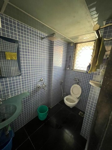 Bathroom in 2 BHK Apartment at RNA Corp Heights, Jogeshwari East – for Rent