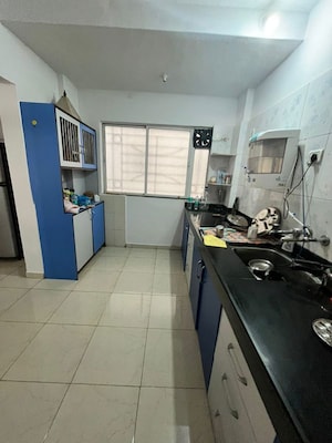 Kitchen in 3 BHK Apartment at Kunal Icon, Pimple Saudagar – for Rent