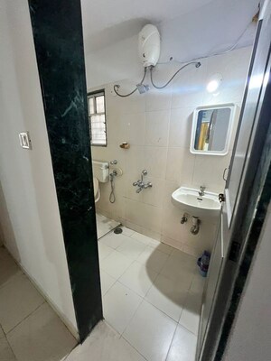 Bathroom in 3 BHK Apartment at Kunal Icon, Pimple Saudagar – for Rent