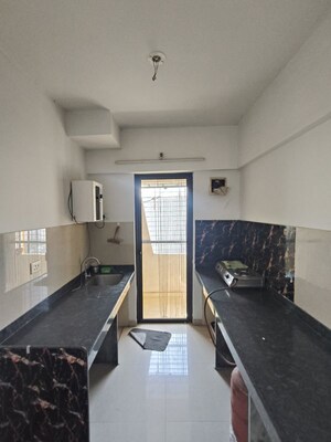 Kitchen in 1 BHK Apartment at Lodha Palava Fontana C To H, Dombivli East – for Rent