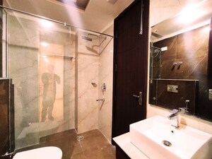 Bathroom in 3 BHK Apartment at Sushant Lok I – for Rent
