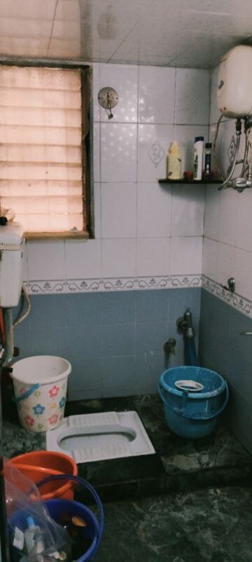 Bathroom in 2 BHK Apartment at Umiya Nagar CHS, Goregaon East – for Rent