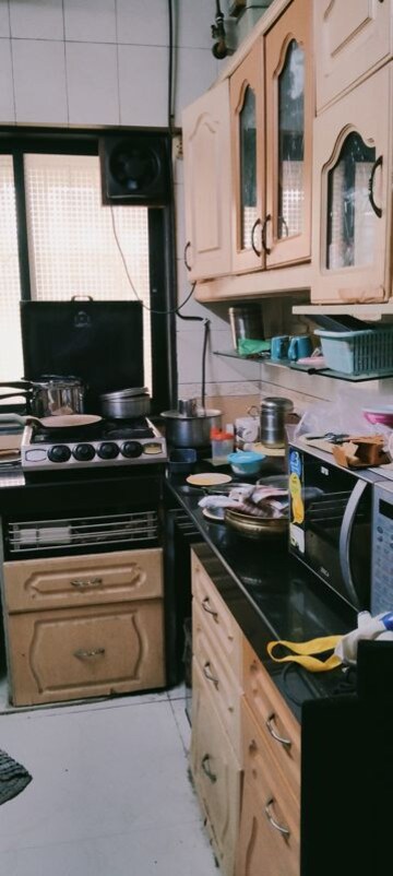 Kitchen in 2 BHK Apartment at Umiya Nagar CHS, Goregaon East – for Rent