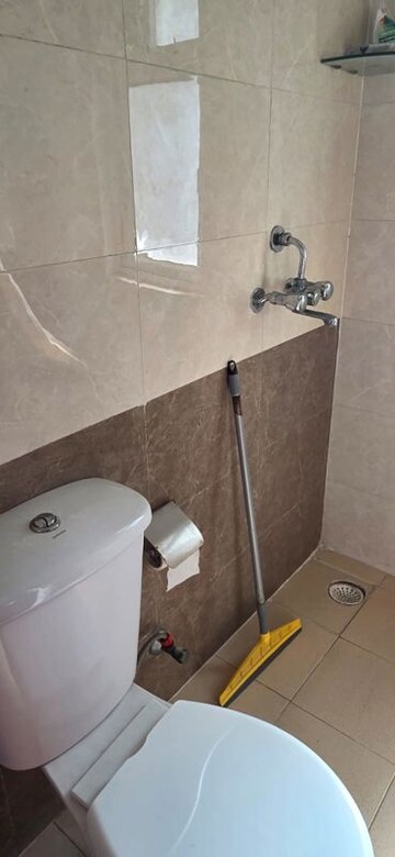 Bathroom in 3 BHK Apartment at Amrapali Silicon City, Sector 76 – for Rent