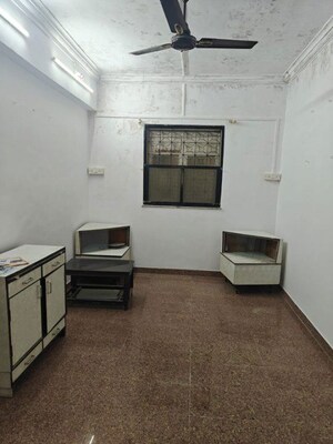 Room in 2 BHK Apartment at Patel CHS Giragaon, Girgaon – for Rent