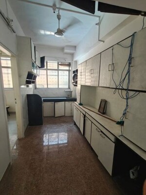 Kitchen in 2 BHK Apartment at Patel CHS Giragaon, Girgaon – for Rent