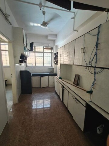 Kitchen in 2 BHK Apartment at Patel CHS Giragaon, Girgaon – for Rent