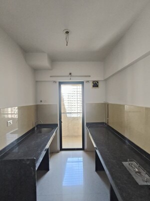 Kitchen in 1 BHK Apartment at Lodha Downtown, Dombivli East – for Sale