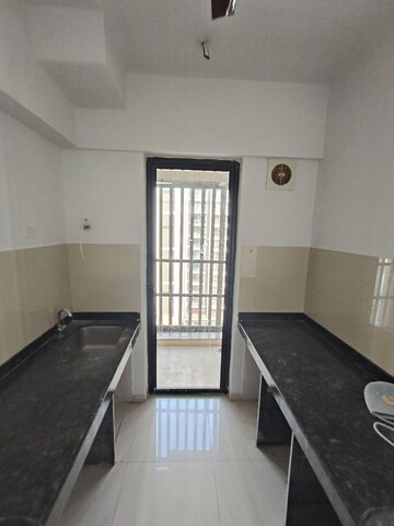 Staircase in 1.5 BHK Apartment at Lodha Lakeshore Greens, Dombivli East – for Rent